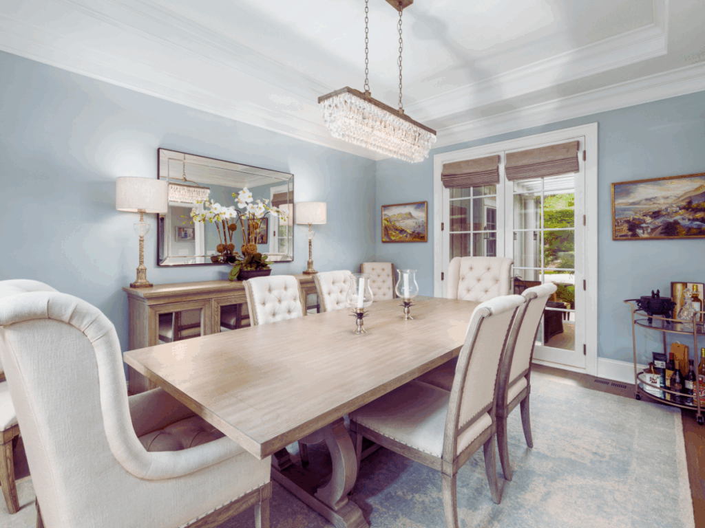 elegant chandelier hanging over dining room table