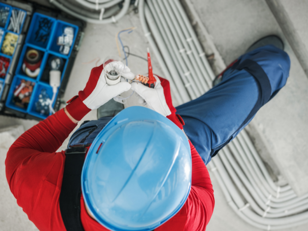 commercial electrician on top of building 