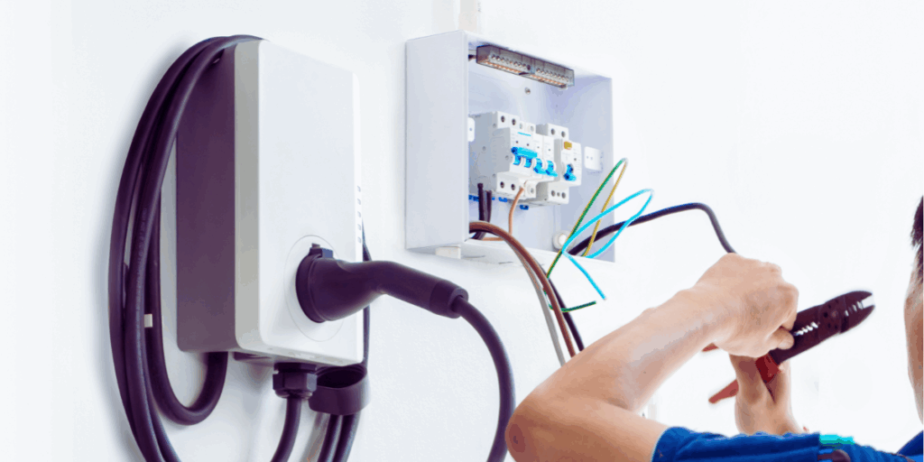 electrician performing ev charger installation 