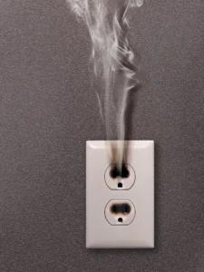 Burnt smoking electrical outlet