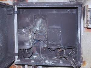 Damaged electrical panel caused by power surge